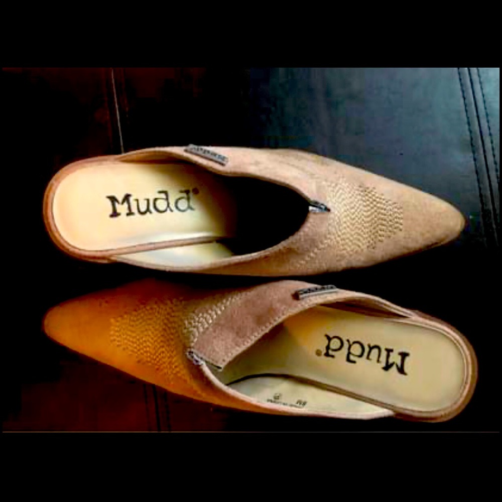 Slip in boot heels. Suede material. Worn one time, heels too high for me.